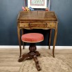 Antique tripod piano stool in adjustable wood