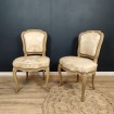 Pair of cream lacquered wooden chairs in the Louis XV style