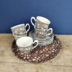 GRIGNY earthenware tray with white flowers on a brown background