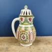 Carafe in coloured enamelled terracotta with openwork lid